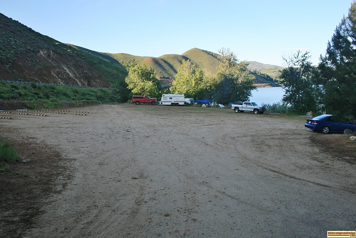 Campsites 1 & 2 are lotaced along the right side of this parking lot in Curlew Creek Boat Ramp & Campground on Anderson Ranch Reservoir.