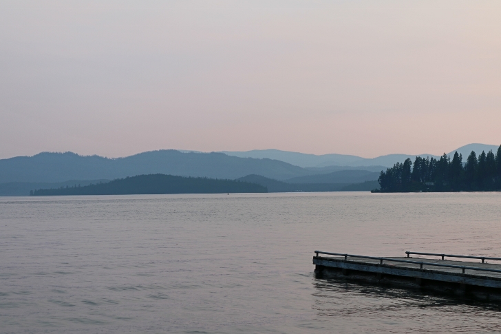 The dock, lake and distant mountains. 
