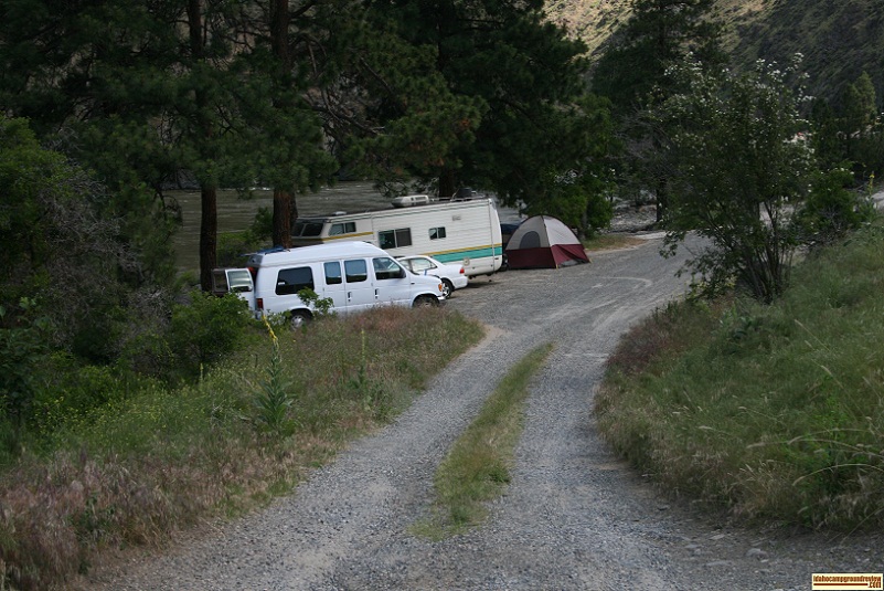 Lightning Creek is undeveloped, note RVs parked in a row.