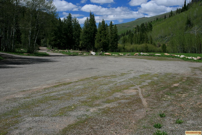 At the entrance there is a large parking area in Lower Penstemon Campground.