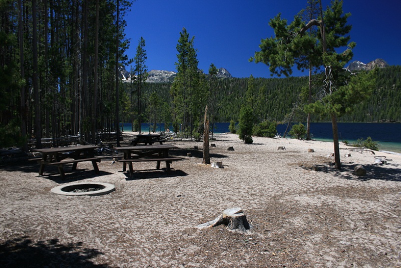 Sandy Beach has picnic tables and fire rings scattered along the beach.
 It appeared that Sandy Beach had less of a crowd than North Shore beach.