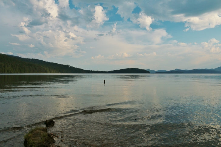 I have included  scenic pictures of the lake, first the lake late in the day with fluffy clouds above.