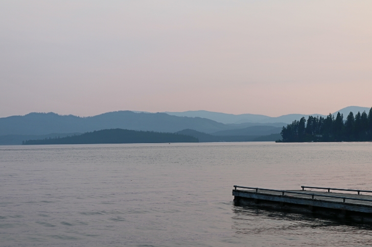 The dock, lake and distant mountains.